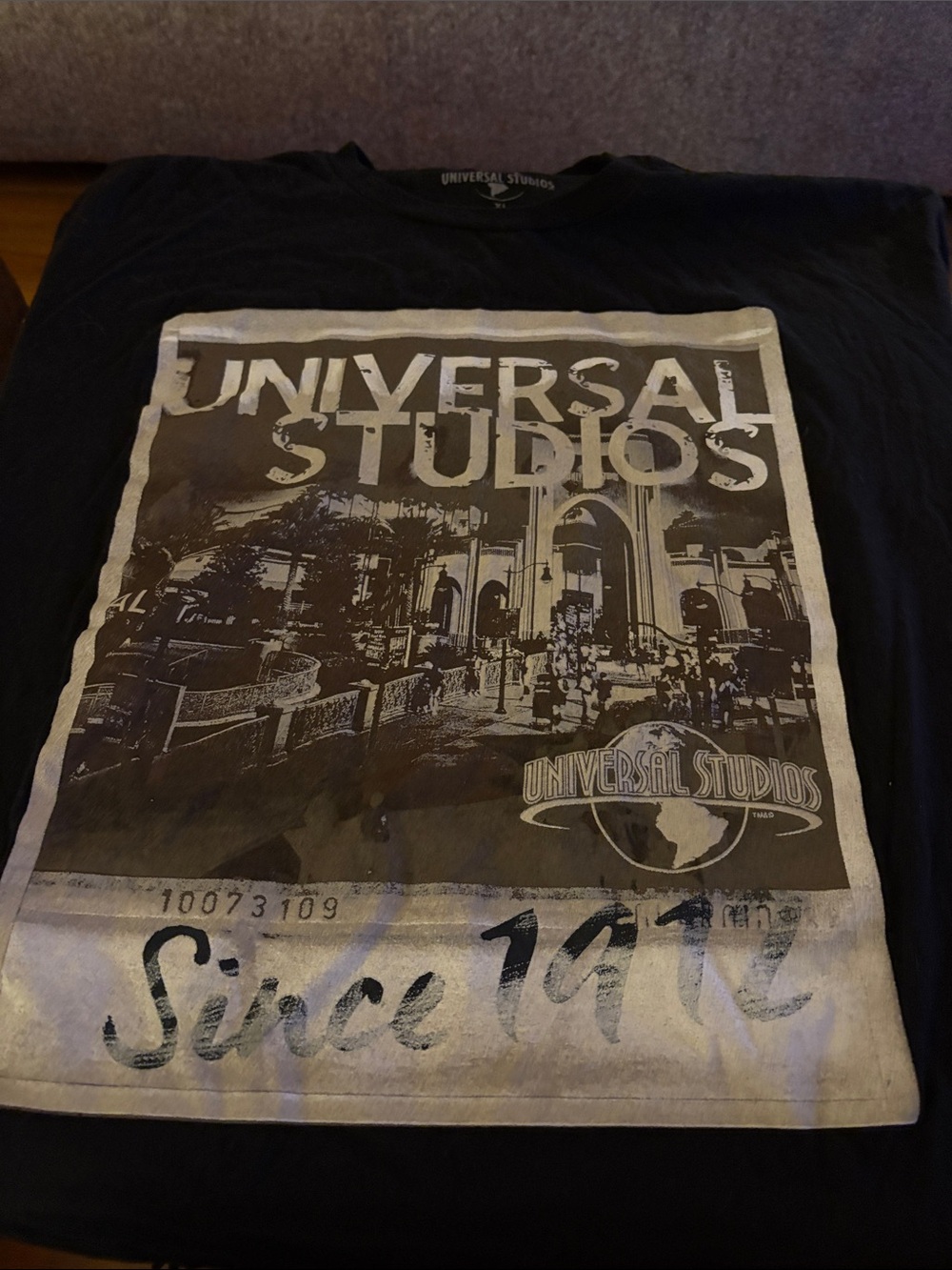 Universal Black Men’s Graphic Tee with Vintage Studios Print